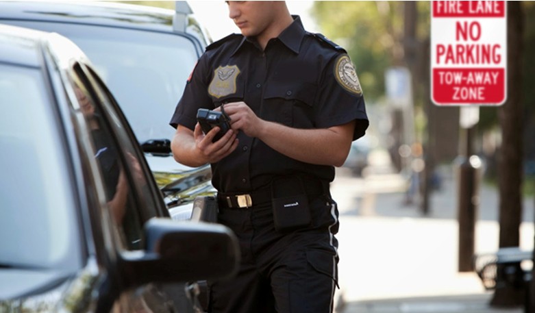 Officer conducting parking enforcement